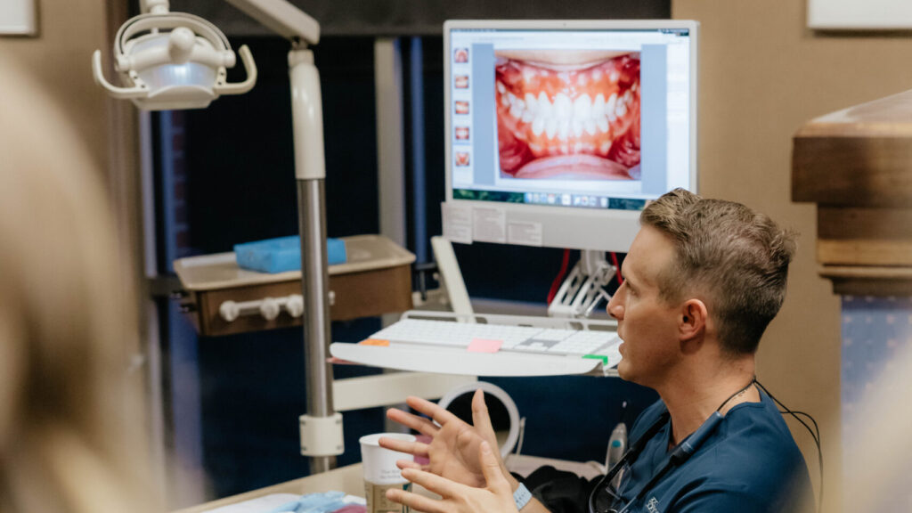 Dr. Santucci explaining a non-extraction orthodontics procedure.